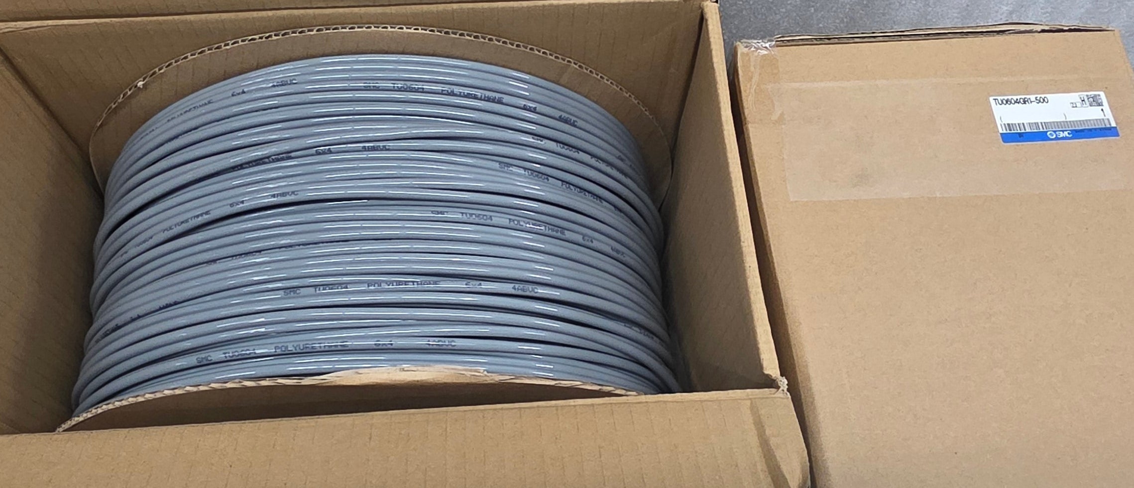 SMC TU0604GR1-500 Tubing; 6mmOD; 4mmID Polyurethane; Gray (500m/1640ft per Roll)